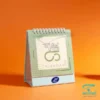 تقویم رومیزی R1129R با ابعاد پایه در دو رنگ صورتی و سبز آبی 12*18 و صفحه 12*12 سانتی متر، صحافی فنری