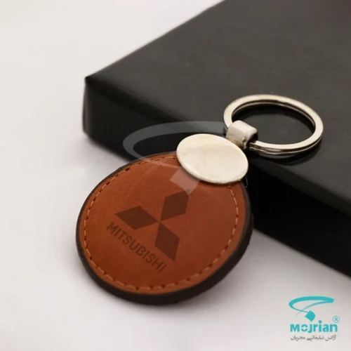 جاکلیدی چرم طبیعی تبلیغاتی N2244 از چرم درجه یک با قلاب و حلقه فلزی مقاوم. رنگ قهوه ای روشن با امکان حک لوگو اختصاصی